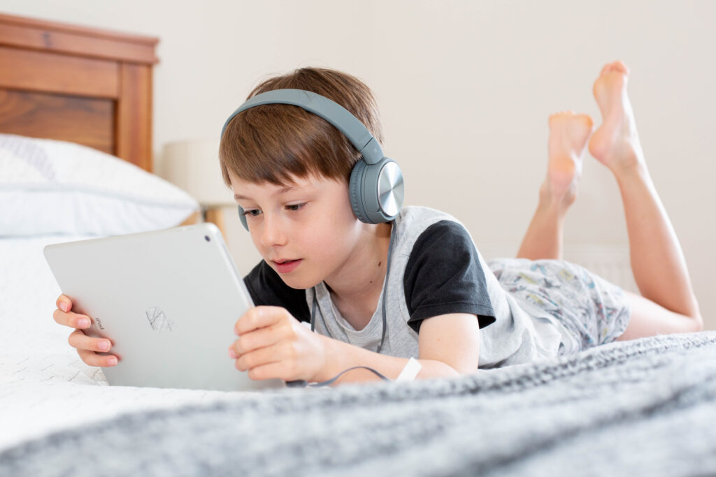 Child reading a desktop